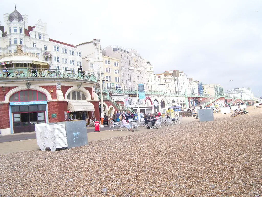 The pebble beach and seafront buildings in Brighton.