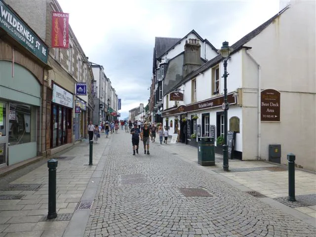 Shops and cobbles along the High Street in Fort William.