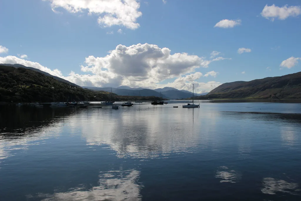 Boats on a calm Loch Broom at Ullapool.