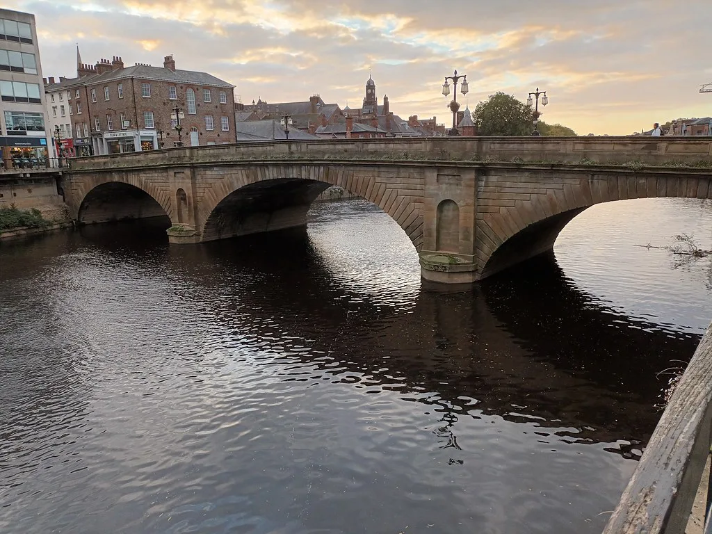 The River Ouse flowing under Ouse Bridge in York city centre.