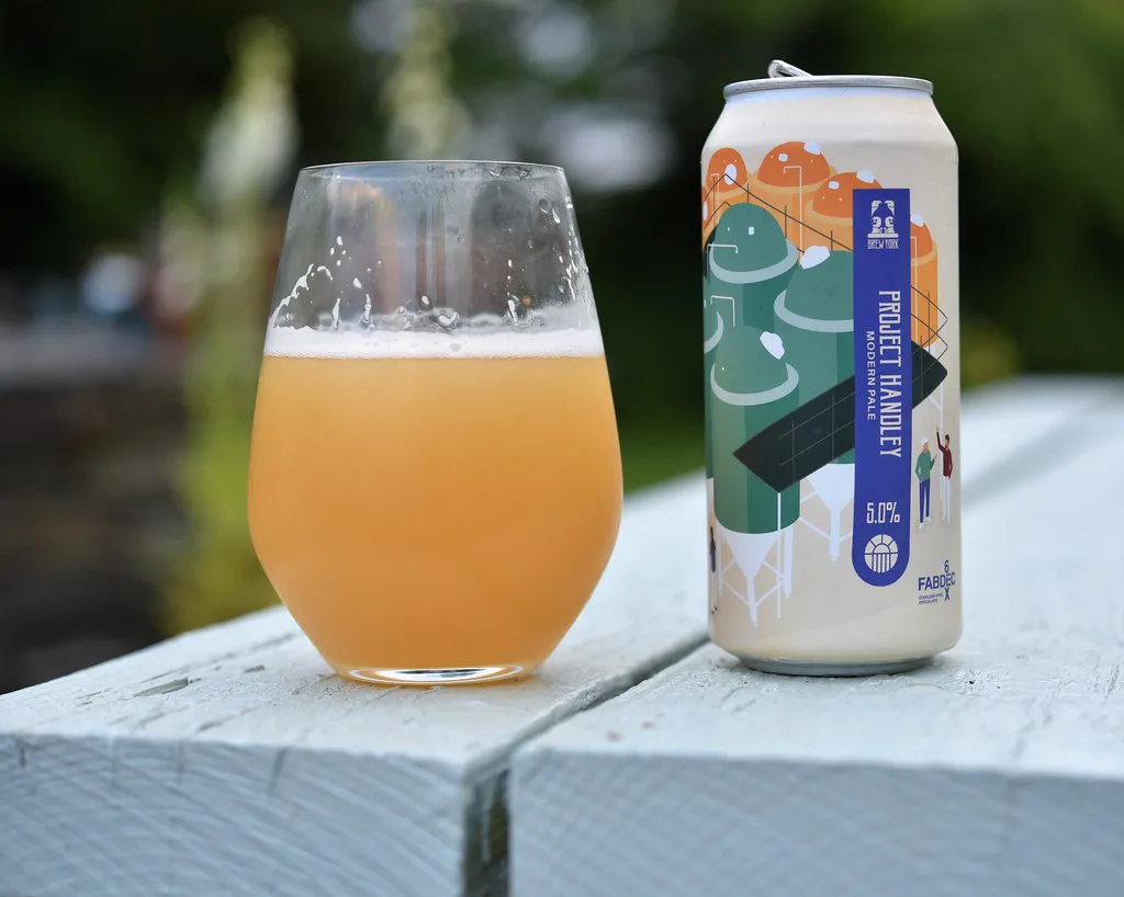 A glass and can of Brew York's Project Handley pale ale.