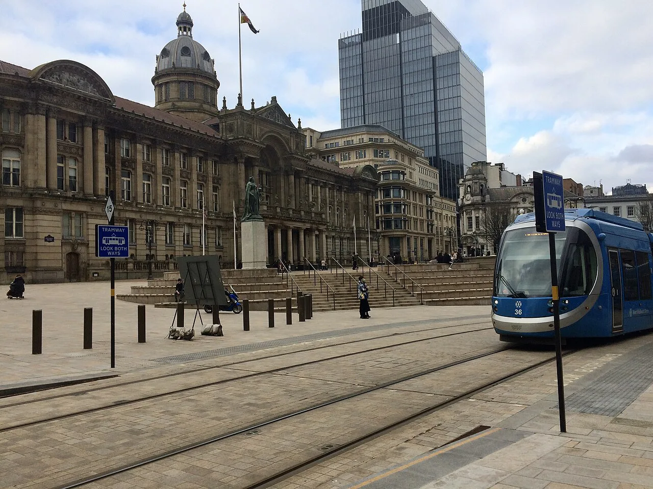 A tram passing the Council House in Birmingham.