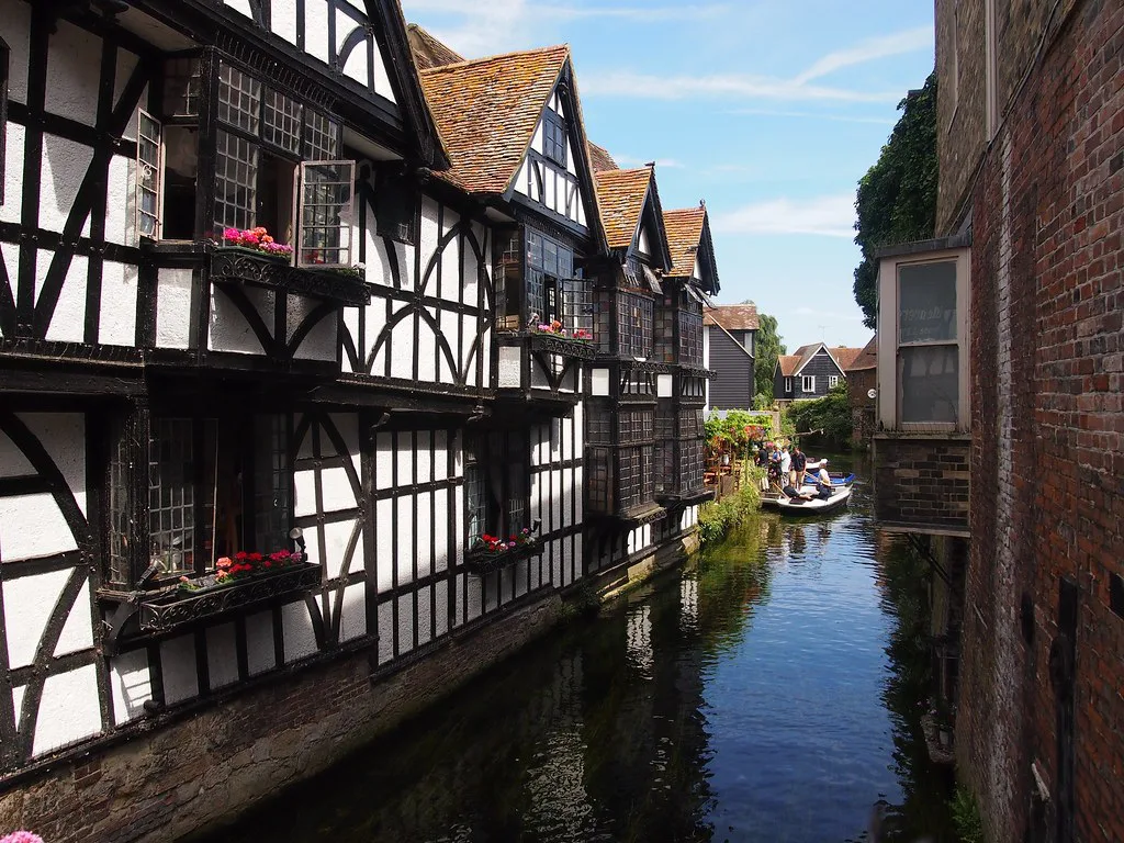 Timber-framed buildings overhanging the River Stour in Canterbury.