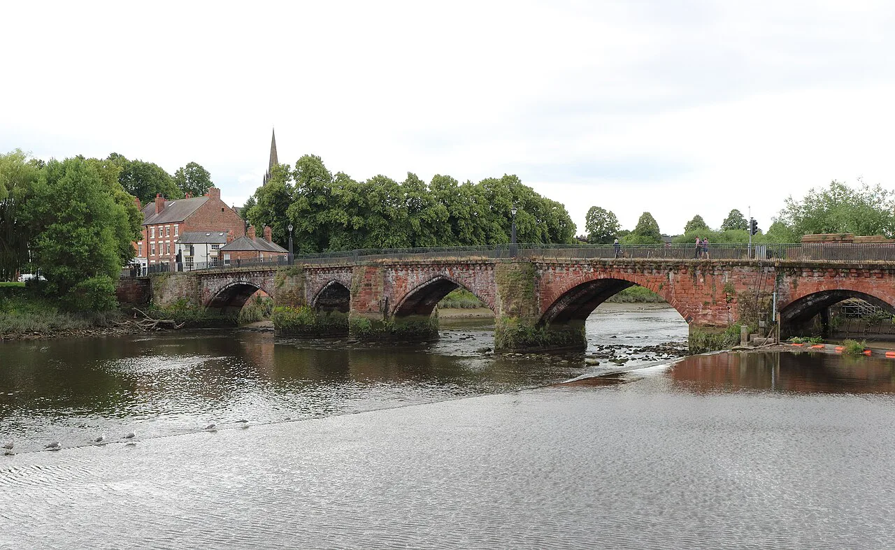 The Old Dee Bridge and weir on the River Dee, Chester.