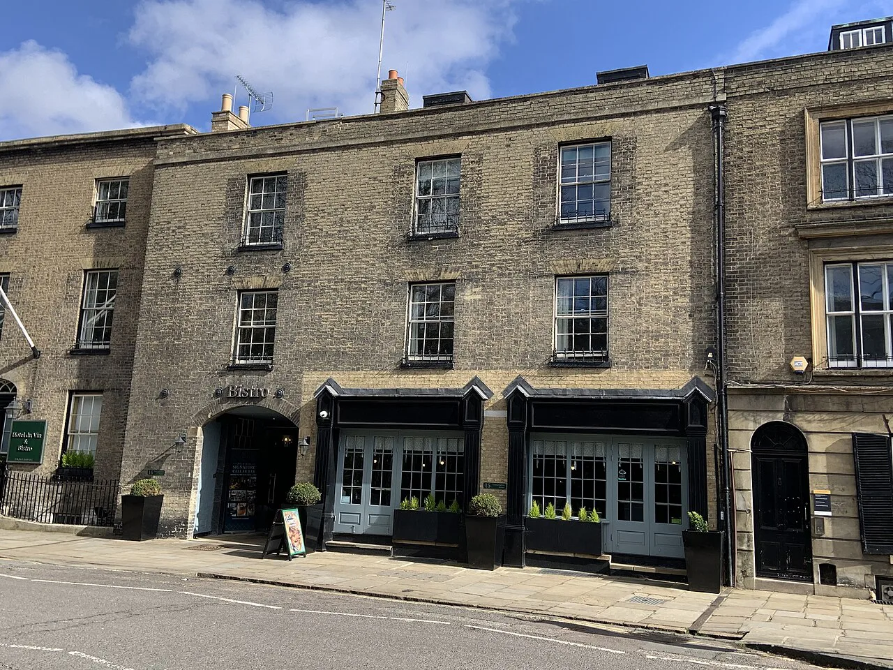 Listed buildings at 15–16 Trumpington Street, Cambridge.