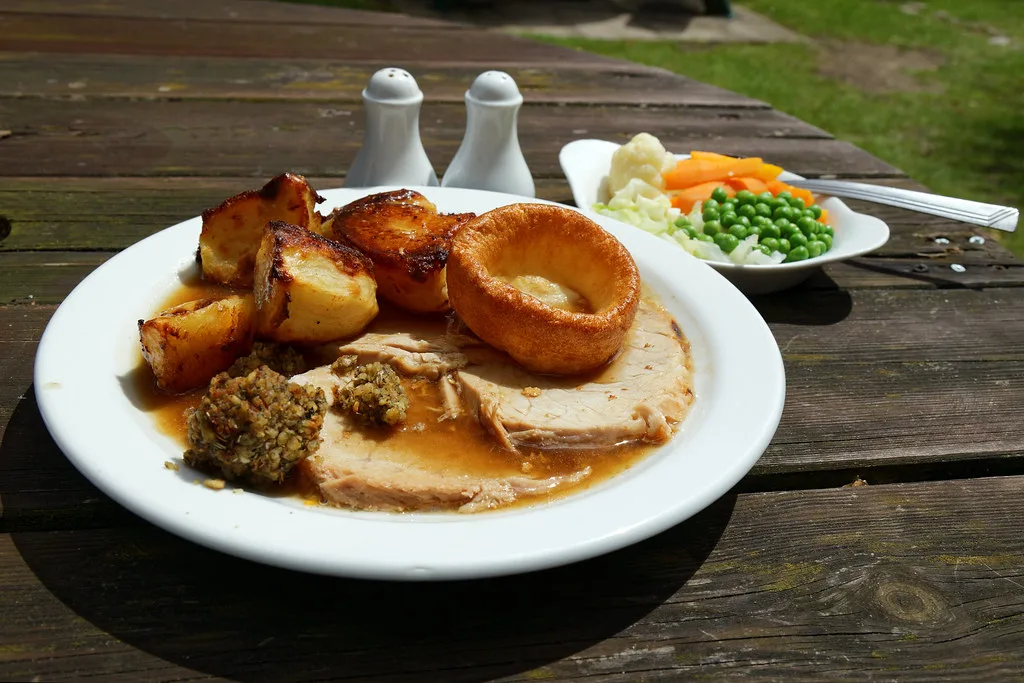 A roast pork Sunday lunch at a pub on Newgate Street, Hatfield, Hertfordshire.