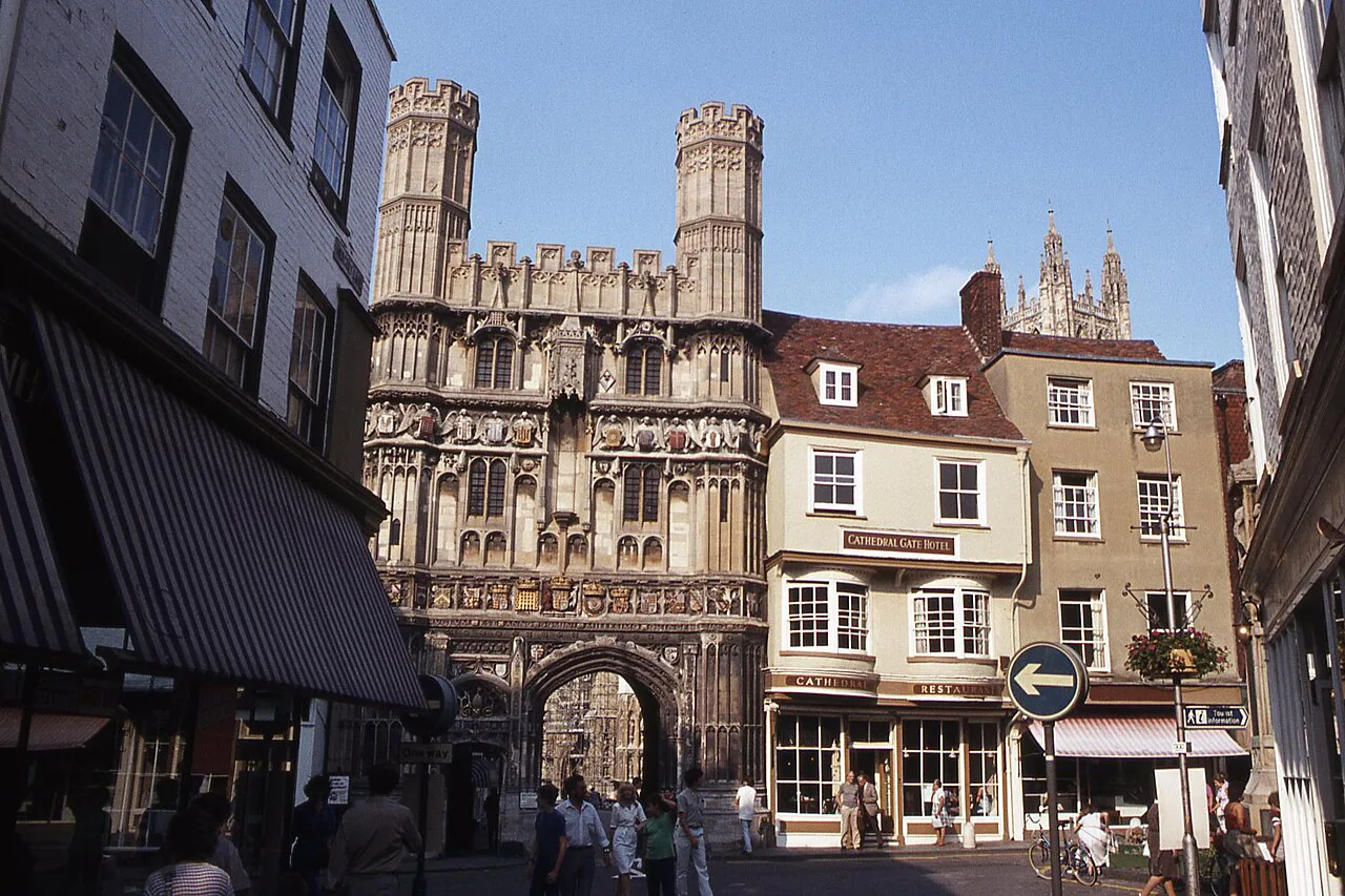 Christ Church Gate, the entrance to Canterbury Cathedral, seen along a city-centre street in Canterbury.