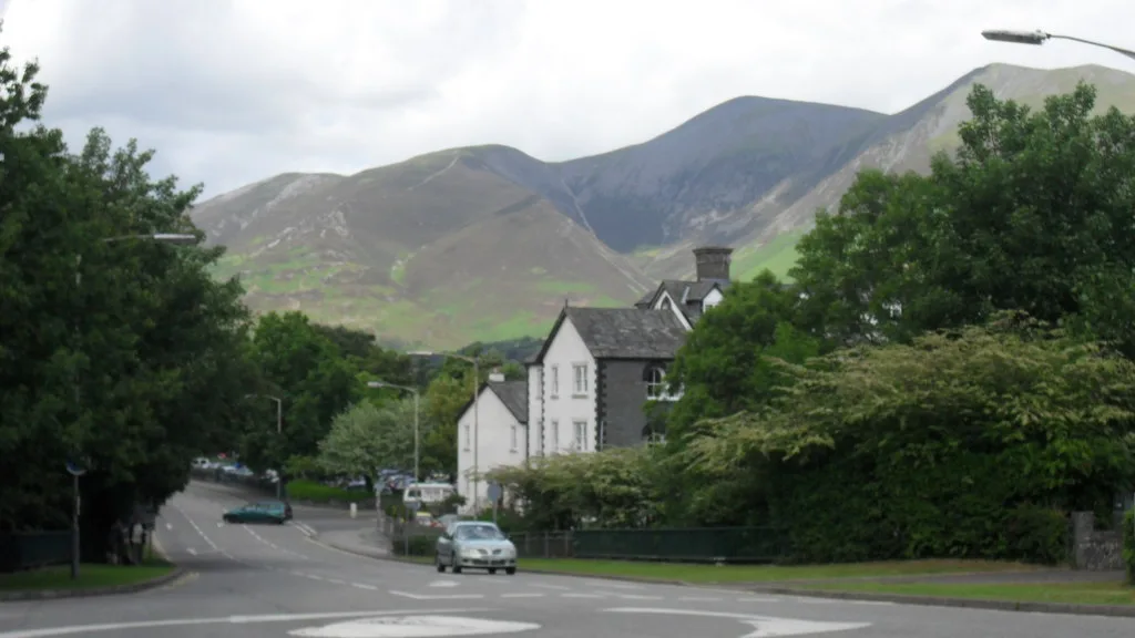 The B5289 heading into Keswick, with the fells rising behind the town.