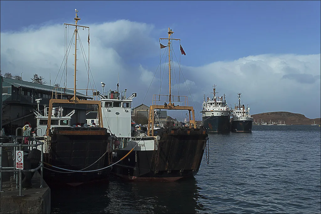 Boats moored in Oban harbour.