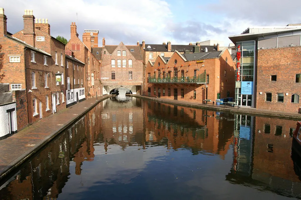 Canalside buildings reflected in Gas Street Basin, Birmingham.