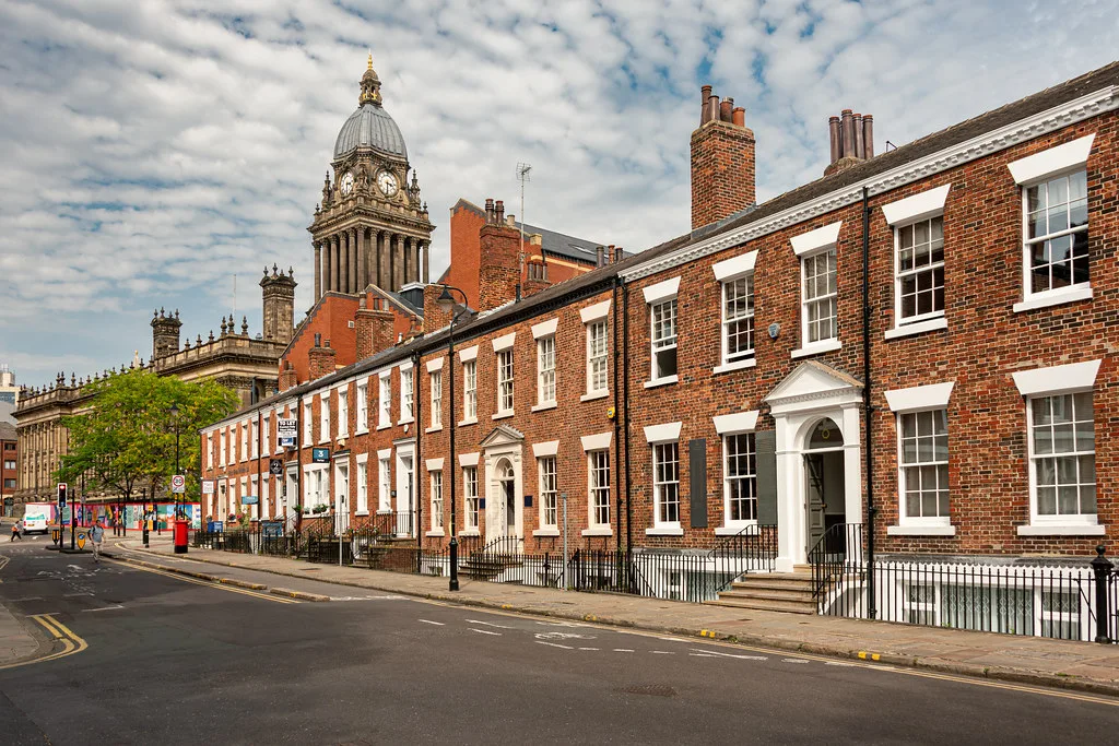 Brick terraces and a Victorian clock tower in Leeds.