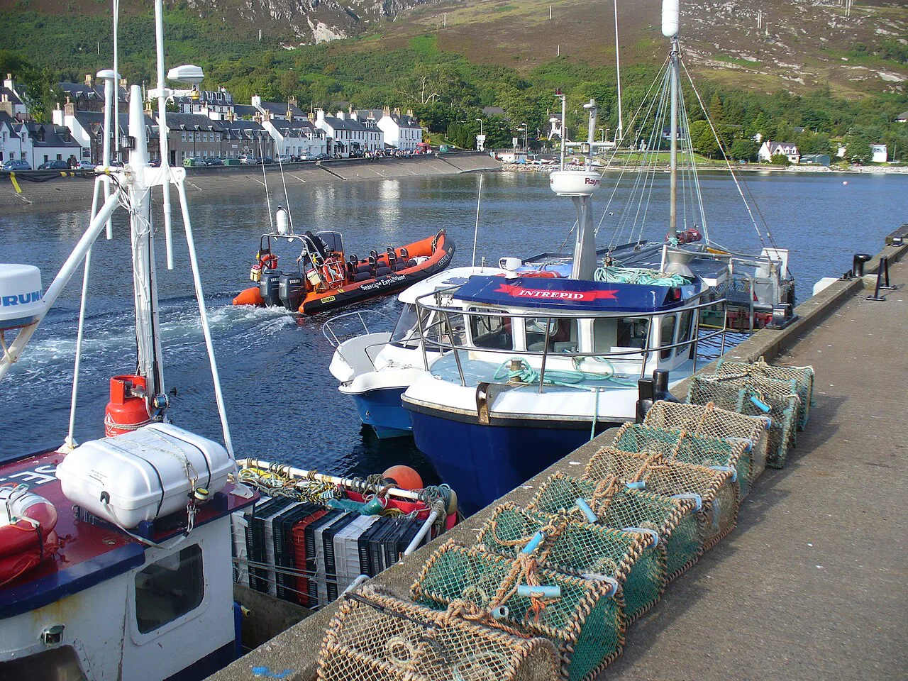 Fishing boats and creels in Ullapool Harbour.
