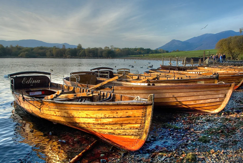 Rowing boats on the shore of Derwentwater, Keswick.