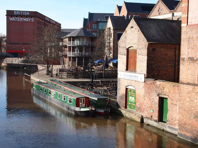 Narrowboats in the Nottingham Canal basin beside the old British Waterways warehouse, Nottingham.