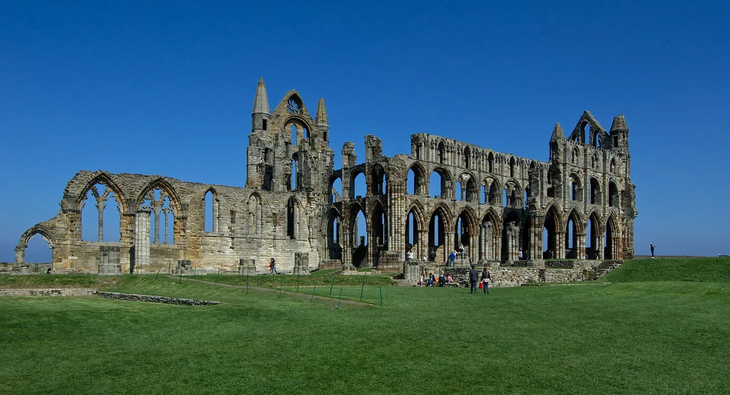 The ruins of Whitby Abbey on the headland.