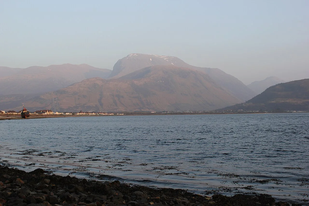 Fort William and Ben Nevis seen across Loch Linnhe before sunset.