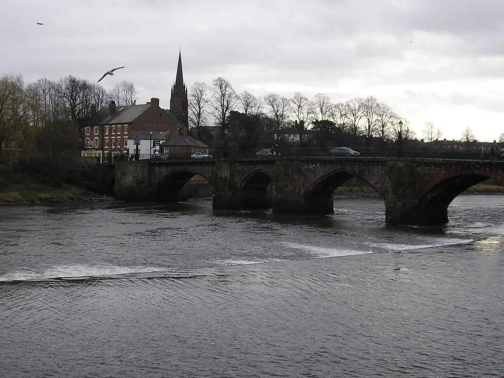 The River Dee and an old stone bridge in Chester.