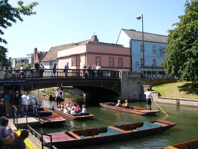 Punts moored by Magdalene Bridge, Cambridge.