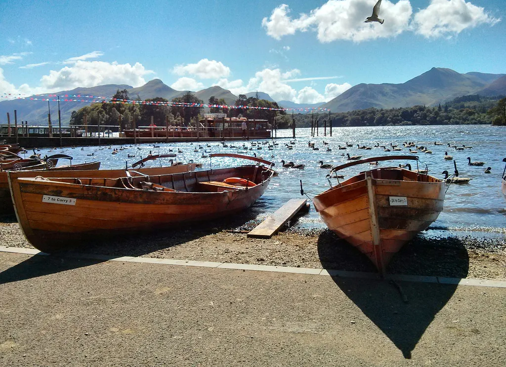 Rowing boats on the Derwentwater shore at Keswick.