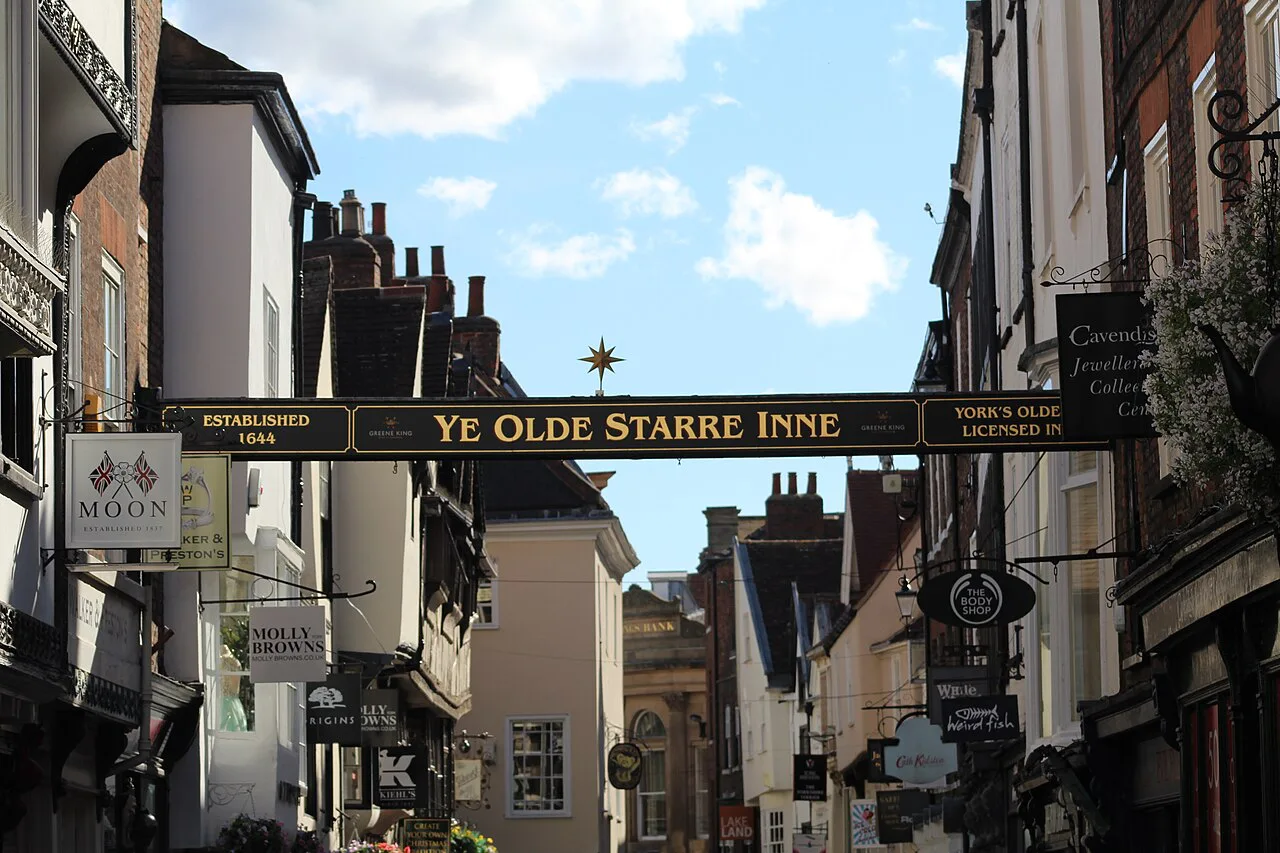 The Ye Olde Starre Inne sign spanning Stonegate, York.